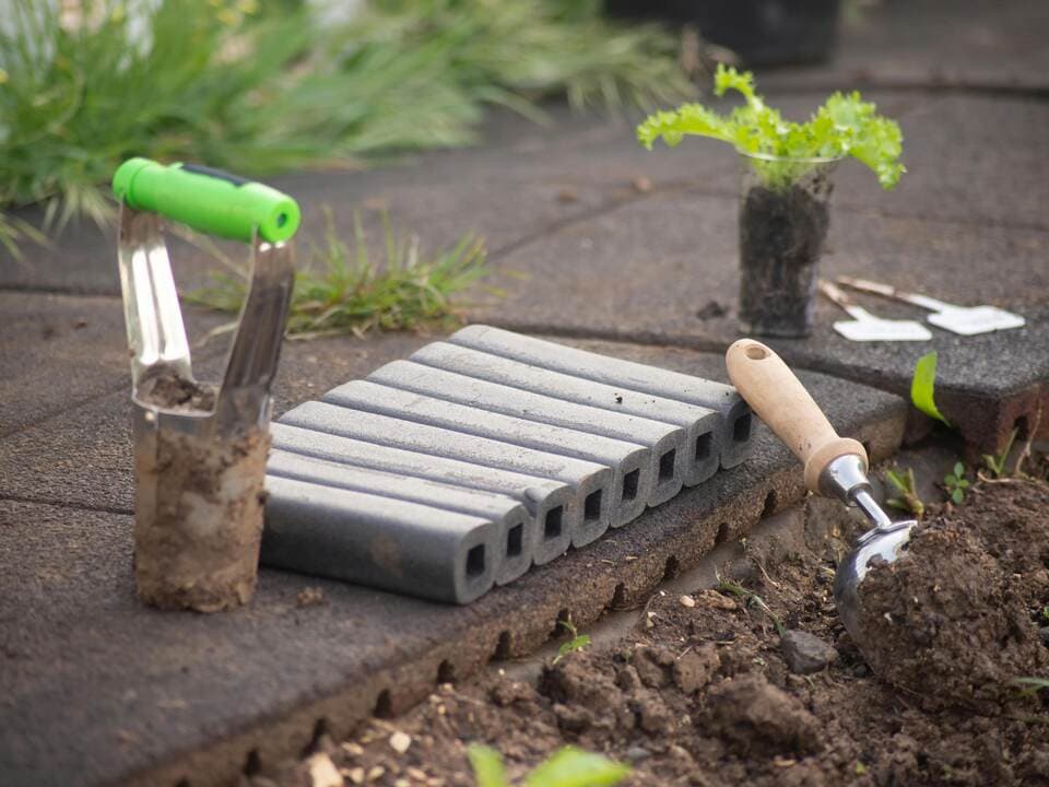 Landscaper or gardener at work in garden
